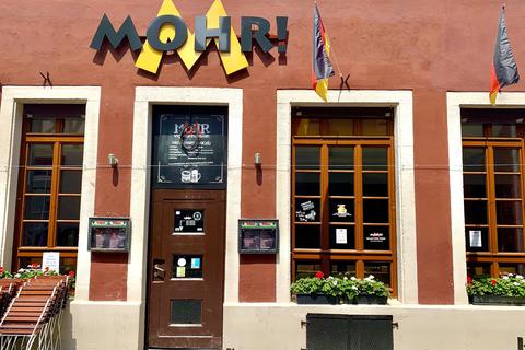 Auch um den neuen Namen des Gasthauses „Mohr!“ in Heidelberg entwickelt sich ein Konflikt. Ein Antirassismus-Netzwerk argumentiert, dass der Name Geringschätzung gegenüber schwarzen Menschen zum_Ausdruck bringe. Foto: Wolf Goldschmitt