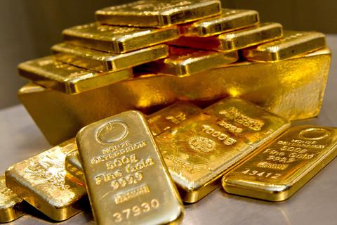 Fachleute halten einen Anstieg des Goldpreises auf bis zu 2000 Dollar für die Feinunze (31,1 Gramm) für möglich. Foto: dpa